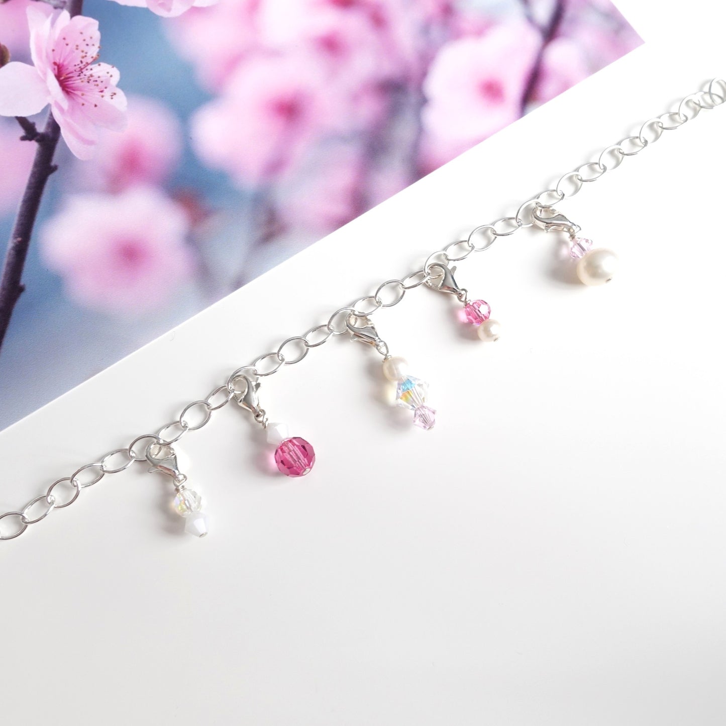 Charm-Set "Kirschblüte" mit 5 Charm-Anhängern aus 925er Silber in rosa, weiß und kristall